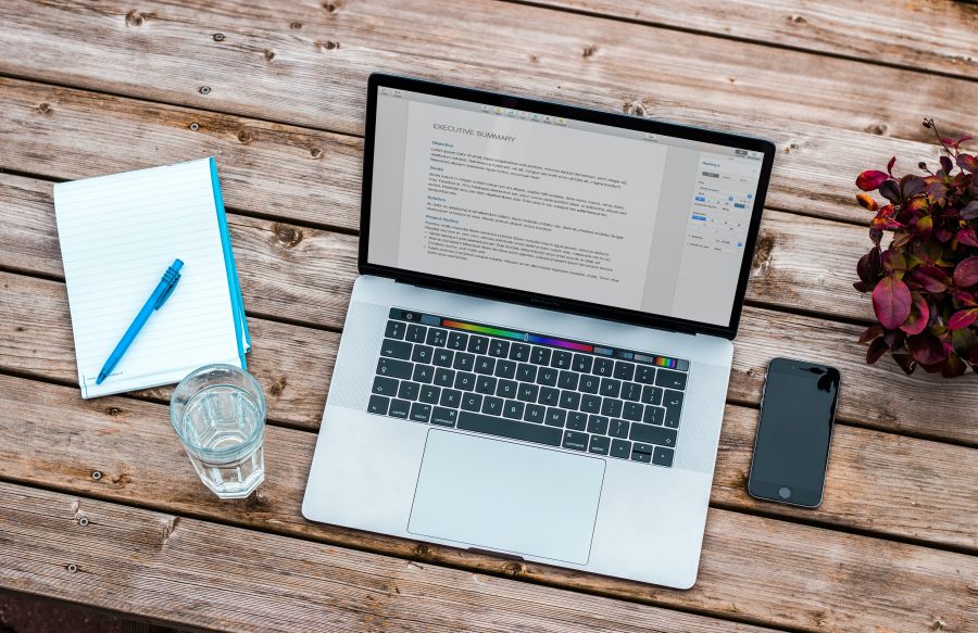 Laptop displaying Word processing document on screen