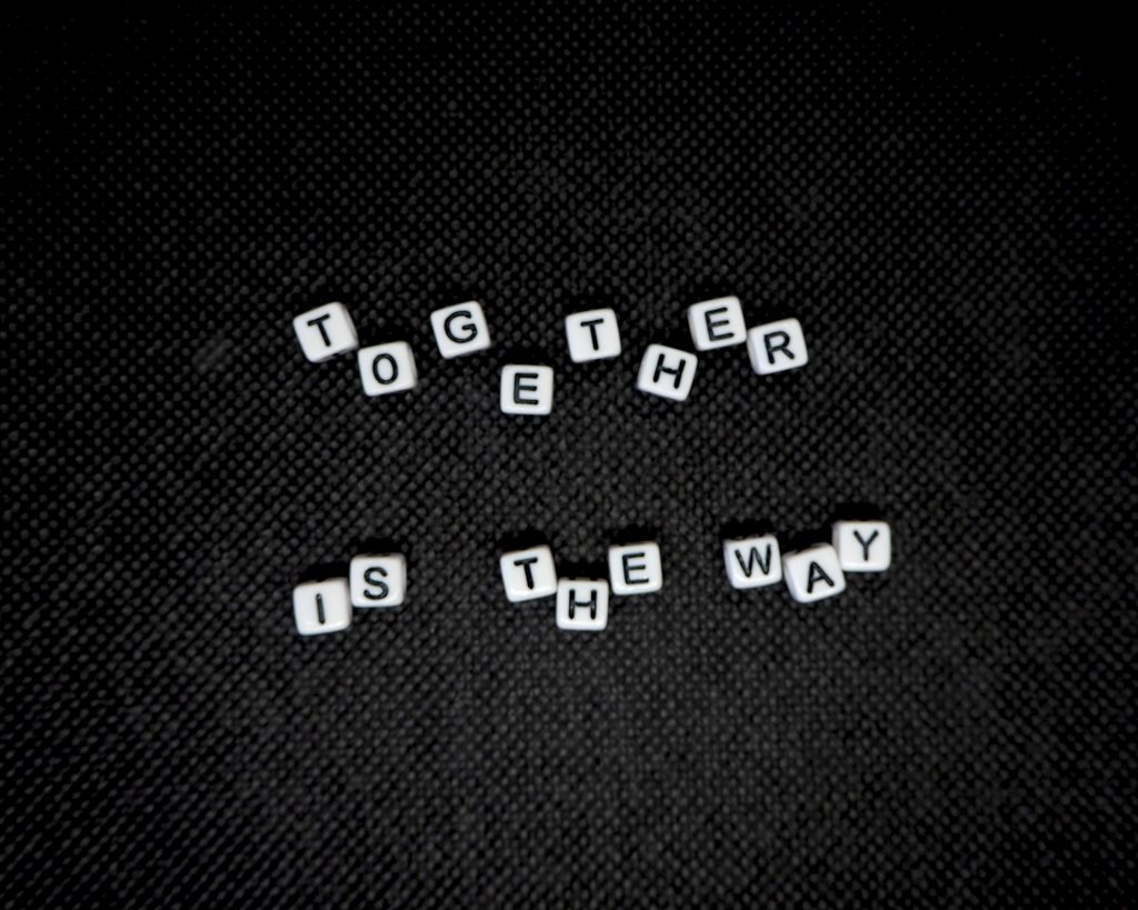 Together is the Way (spelt out with letter cubes)