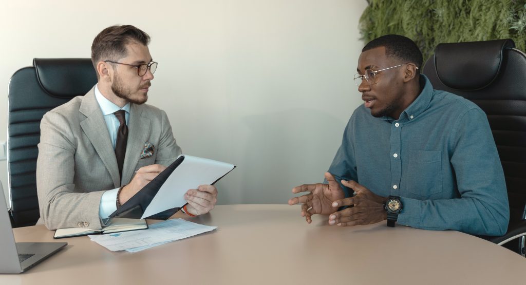 Two male colleagues in a meeting