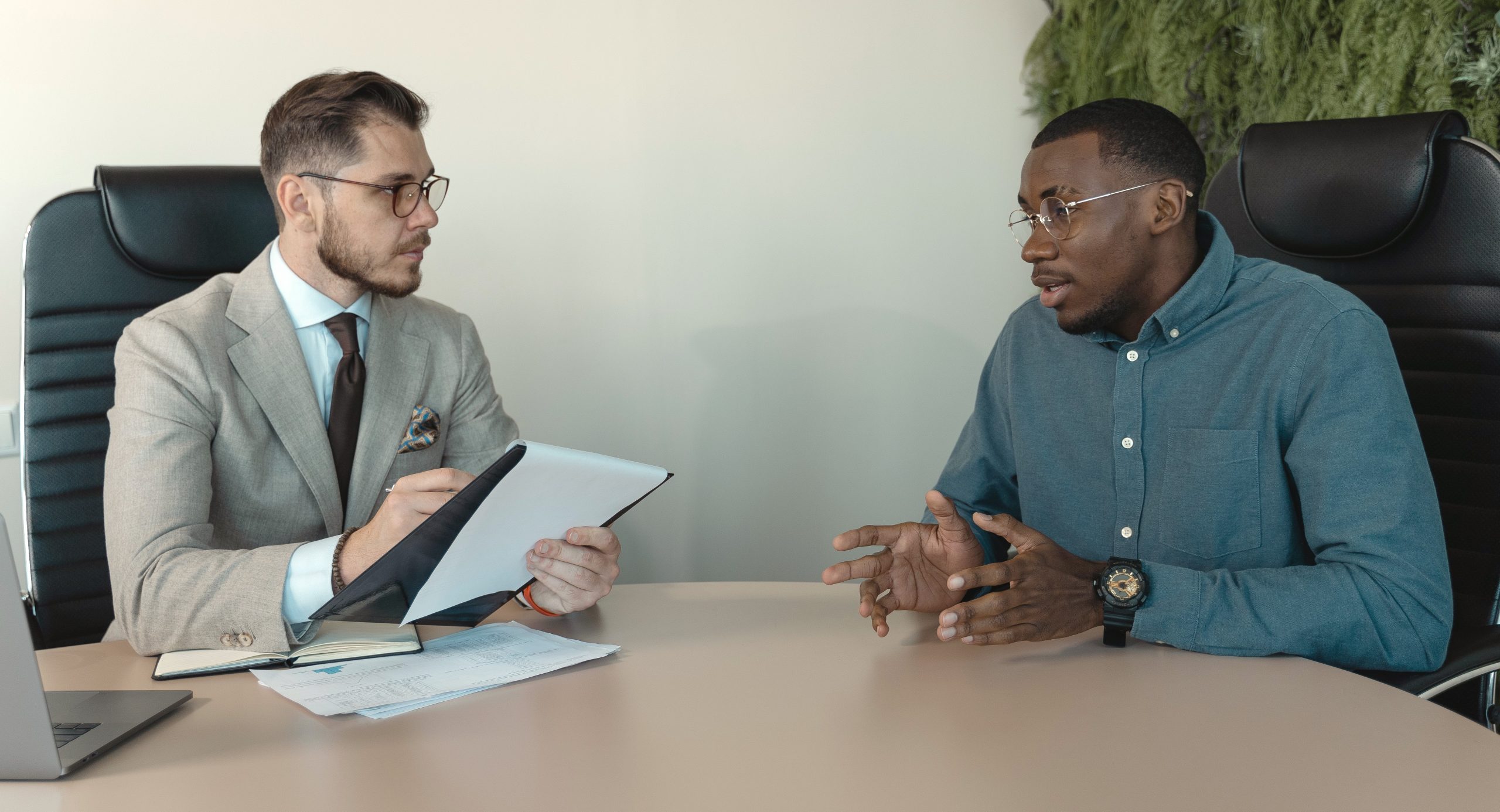 Two male colleagues in a meeting